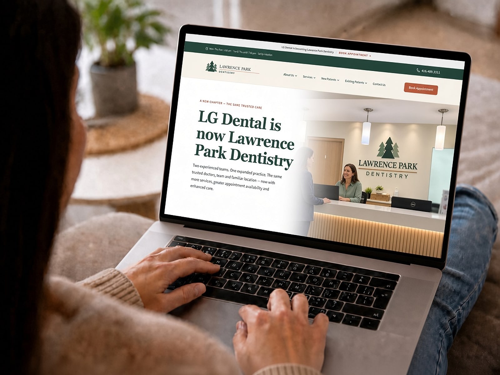Person browsing the new Lawrence Park Dentistry website on a laptop