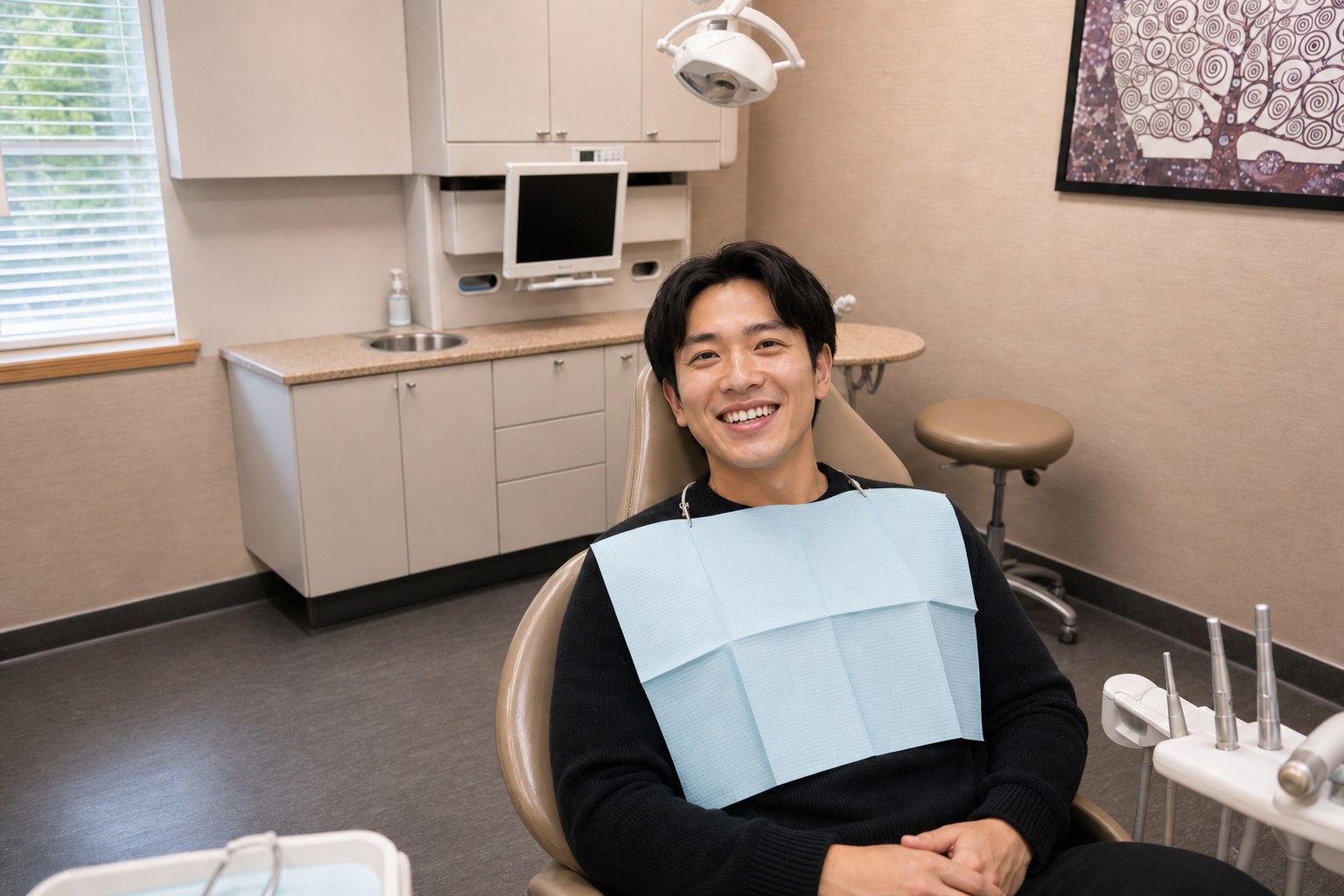 Patient smiling after knocked-out tooth repair at Lawrence Park Dentistry
